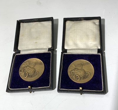 Lot 564 - Two motoring medallions