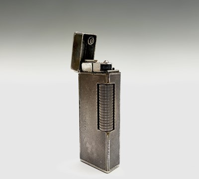 Lot 382 - A Dunhill silver plated Rollagas lighter