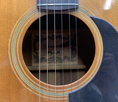 Lot 157 - A 1970s Yamaki Deluxe Folk acoustic guitar.