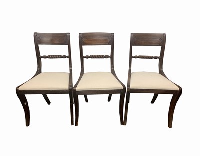 Lot 3035 - A set of three Regency mahogany dining chairs,...