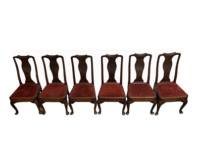 Lot 3066 - A set of six George II walnut dining chairs,...