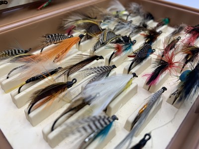 Lot 17 - Two boxes of assorted fishing flies and a...