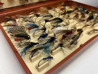 Lot 17 - Two boxes of assorted fishing flies and a...