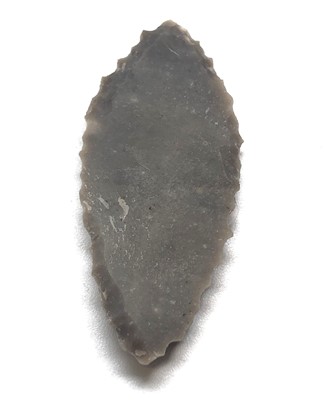 Lot 438 - Neolithic elongate, leaf shaped arrow head, Ex...