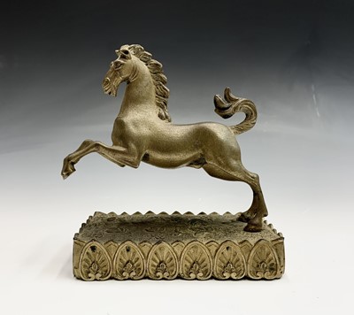 Lot 62 - A Regency gilt bronze figure of a rearing...