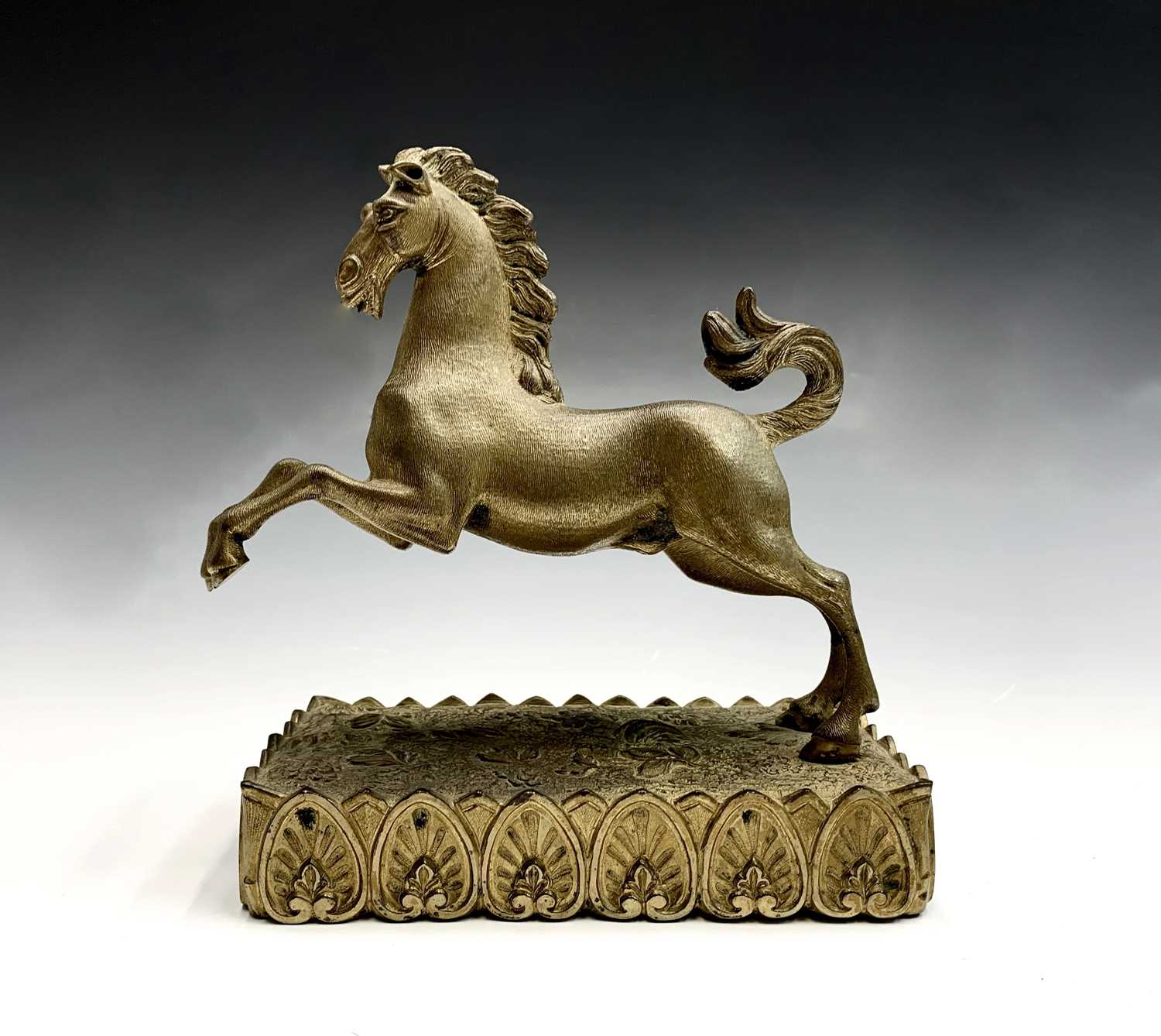 Lot 62 - A Regency gilt bronze figure of a rearing...