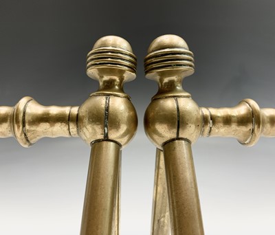 Lot 73 - A pair of Aesthetic Movement brass andirons,...