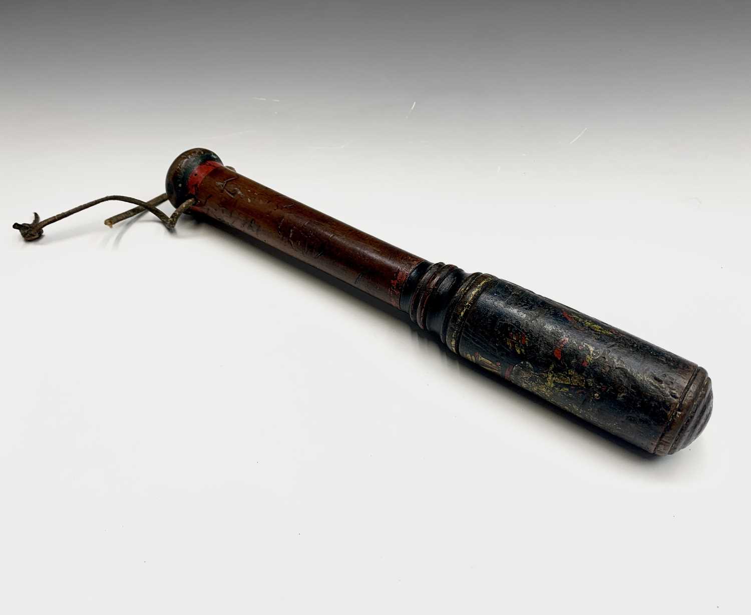 Lot 74 - A George IV painted truncheon, length 34cm.