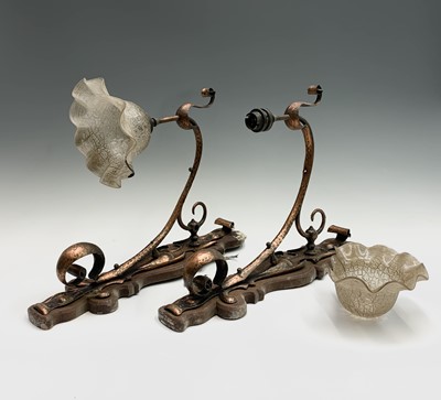 Lot 112 - A pair of Arts and Crafts copper wall lights,...