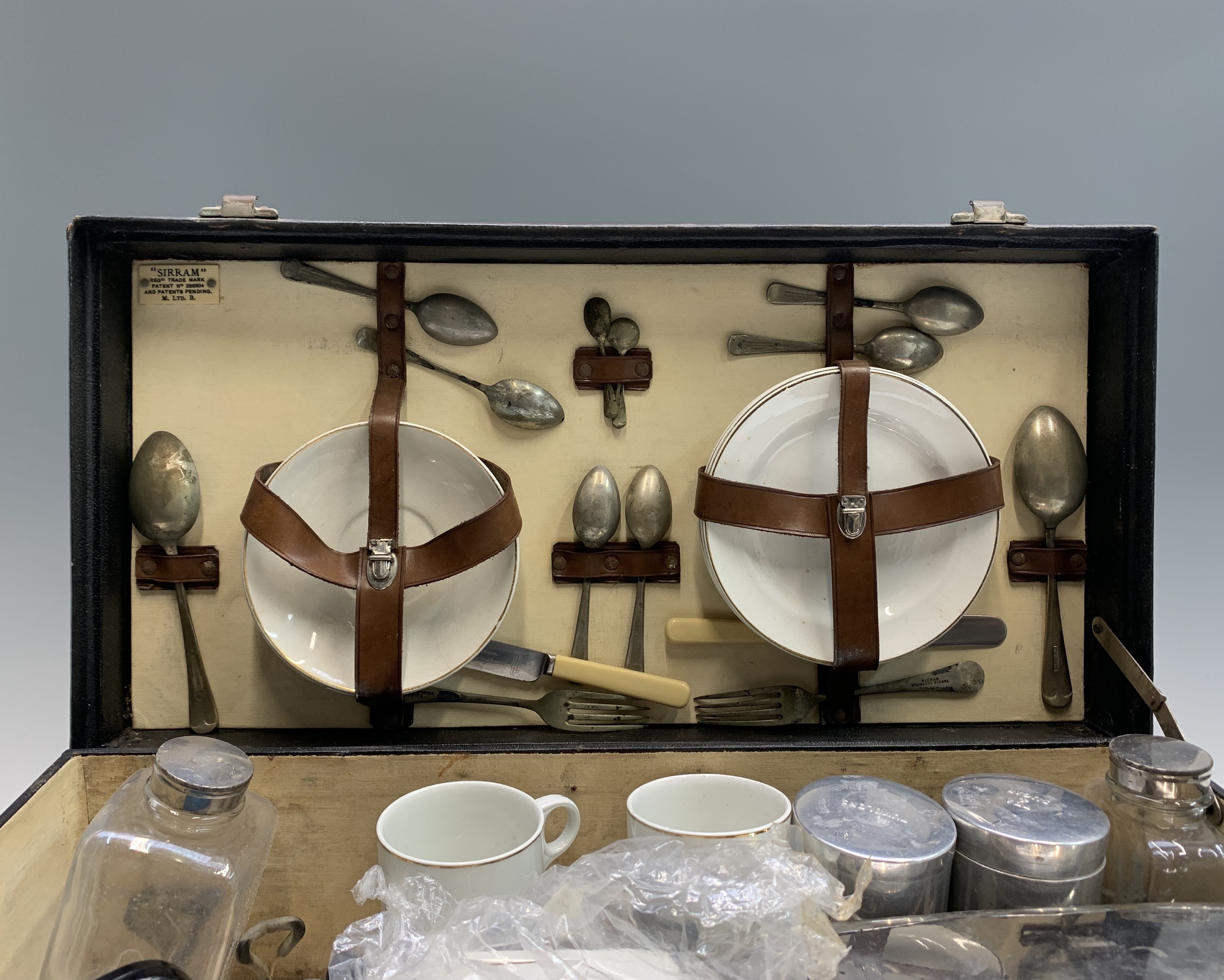 Lot 68 - A vintage Sirram cased picnic set, mid 20th