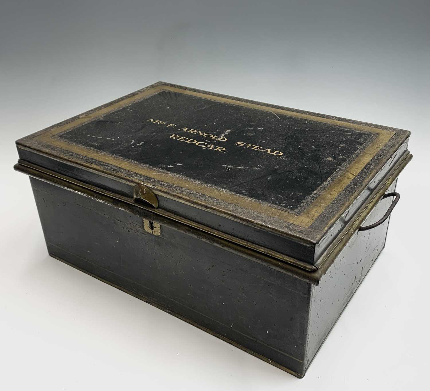 Lot 189 An Edwardian lacquered tin gown box, with