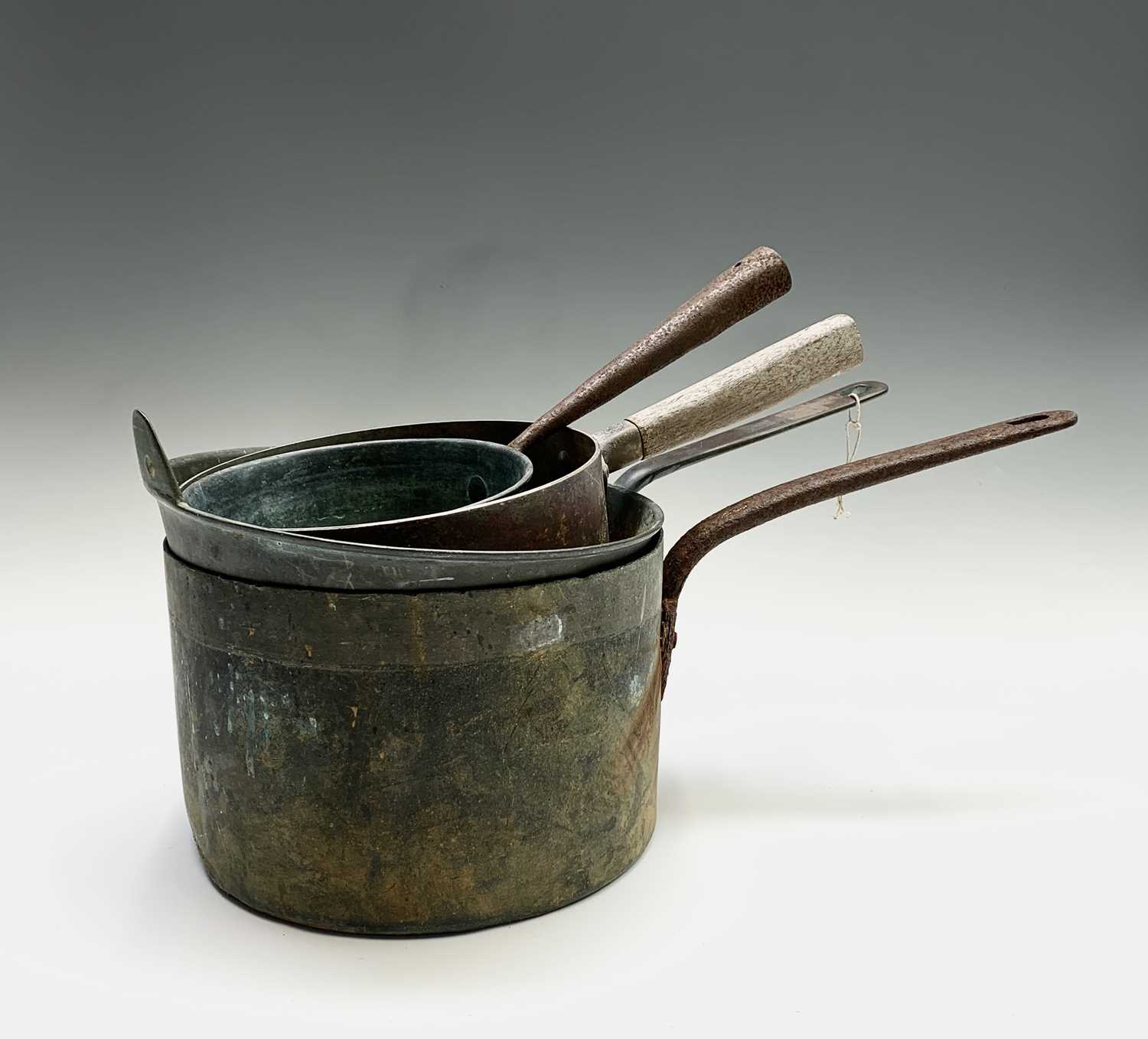 Lot 244 - Four assorted saucepans. Largest height 16cm,...