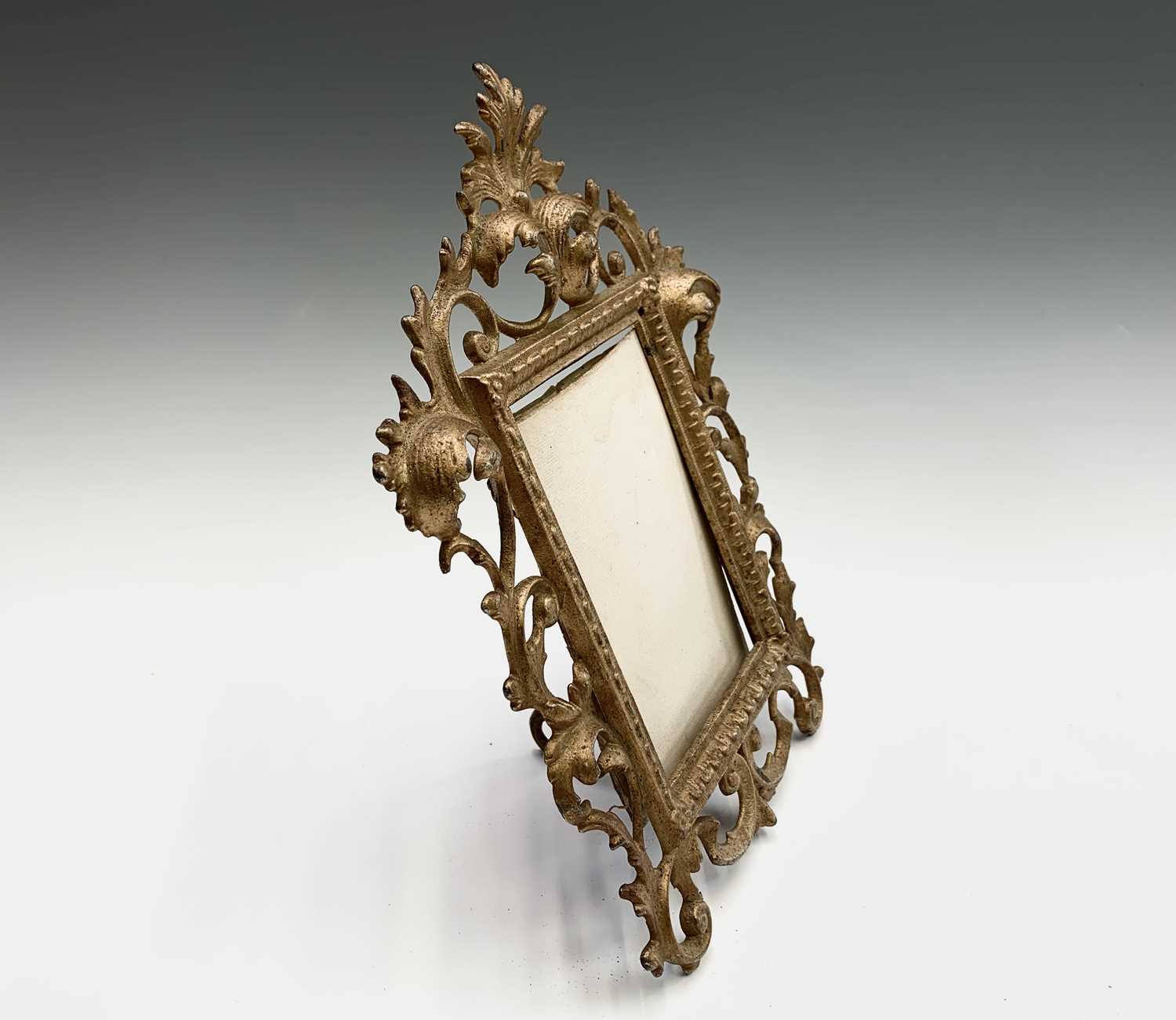 Lot 187 - A gilt metal Rococo style photograph frame,