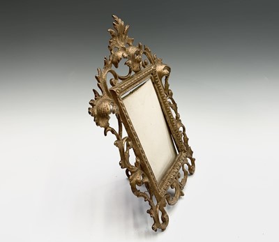 Lot 187 - A gilt metal Rococo style photograph frame, 30....