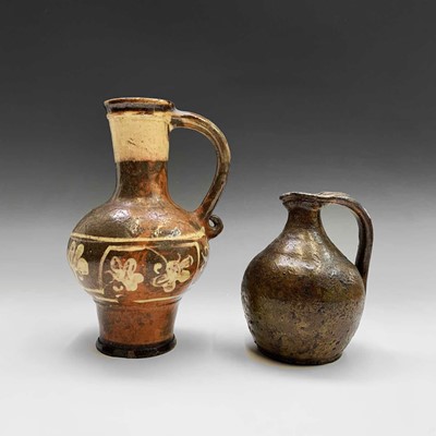 Lot 925 - A probably post-medieval brown glazed pottery...