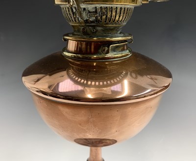 Lot 54 - A Messengers Patent copper oil lamp, together...