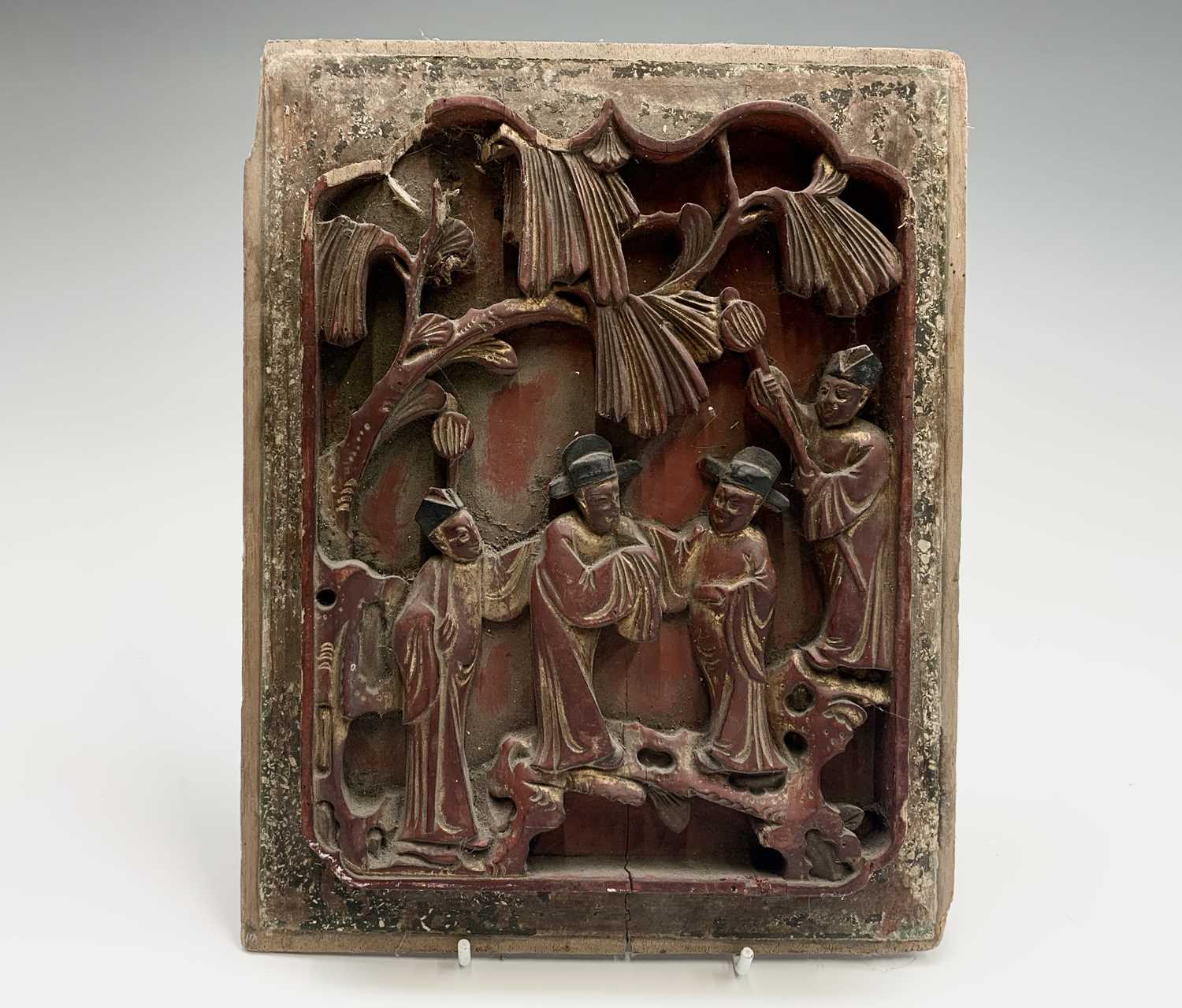 Lot 185 - A Chinese red painted carved wood panel, 19th...