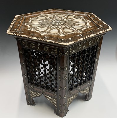 Lot 1004 - A Damascus hardwood octagonal occasional table,...