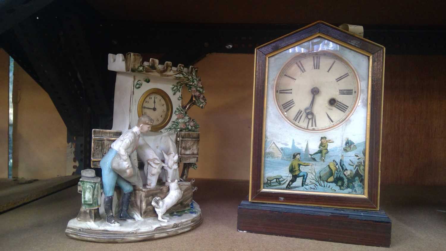 Lot 6 - Ceramic mantle clock modelled as a stable...