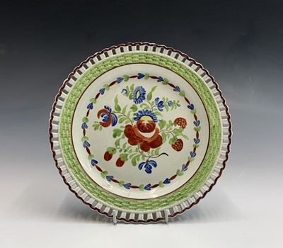 Lot 853 - A Victorian pottery nursery plate, with...