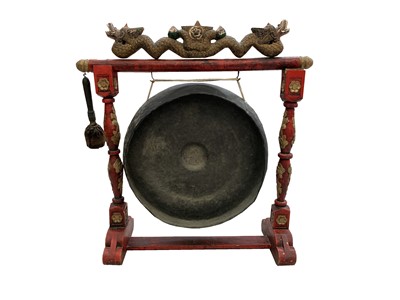 Lot 120 - A Chinese carved wood and metal gong, with a...