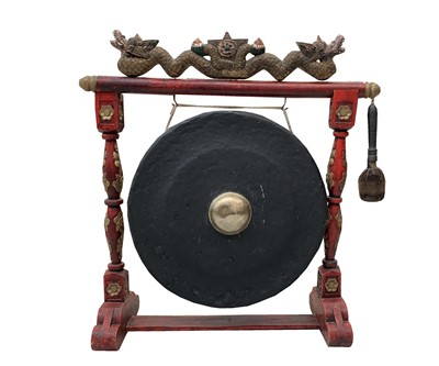 Lot 120 - A Chinese carved wood and metal gong, with a...