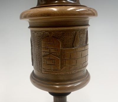 Lot 1018 - Two Jerusalem olive wood urns and covers, each...