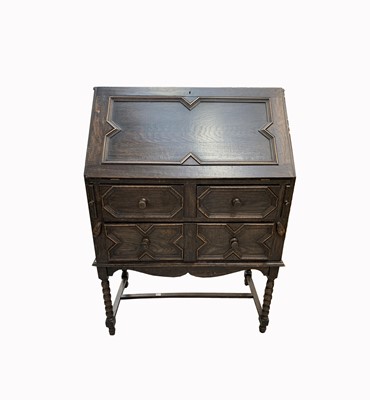 Lot 3071 - A Jacobean style oak bureau on stand, early...