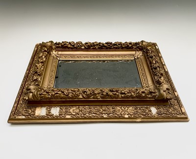 Lot 3075 - A Victorian gilt gesso wall mirror, with later...