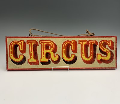 Lot 132 - A signwritten wooden sign 'CIRCUS', having red...