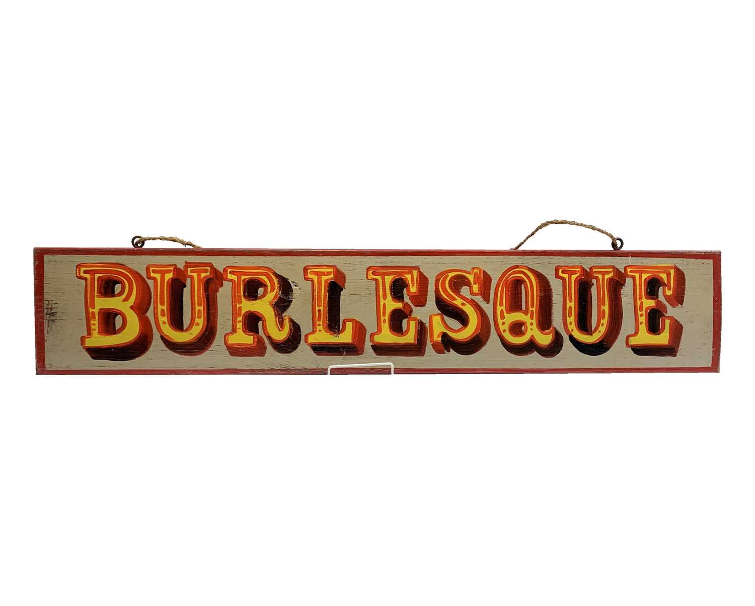 Lot 133 - A signwritten wooden sign 'BURLESQUE', having...