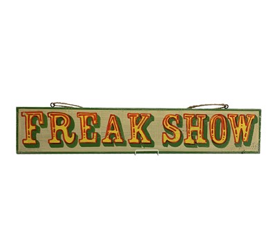 Lot 136 - A signwritten wooden sign 'FREAK SHOW', having...