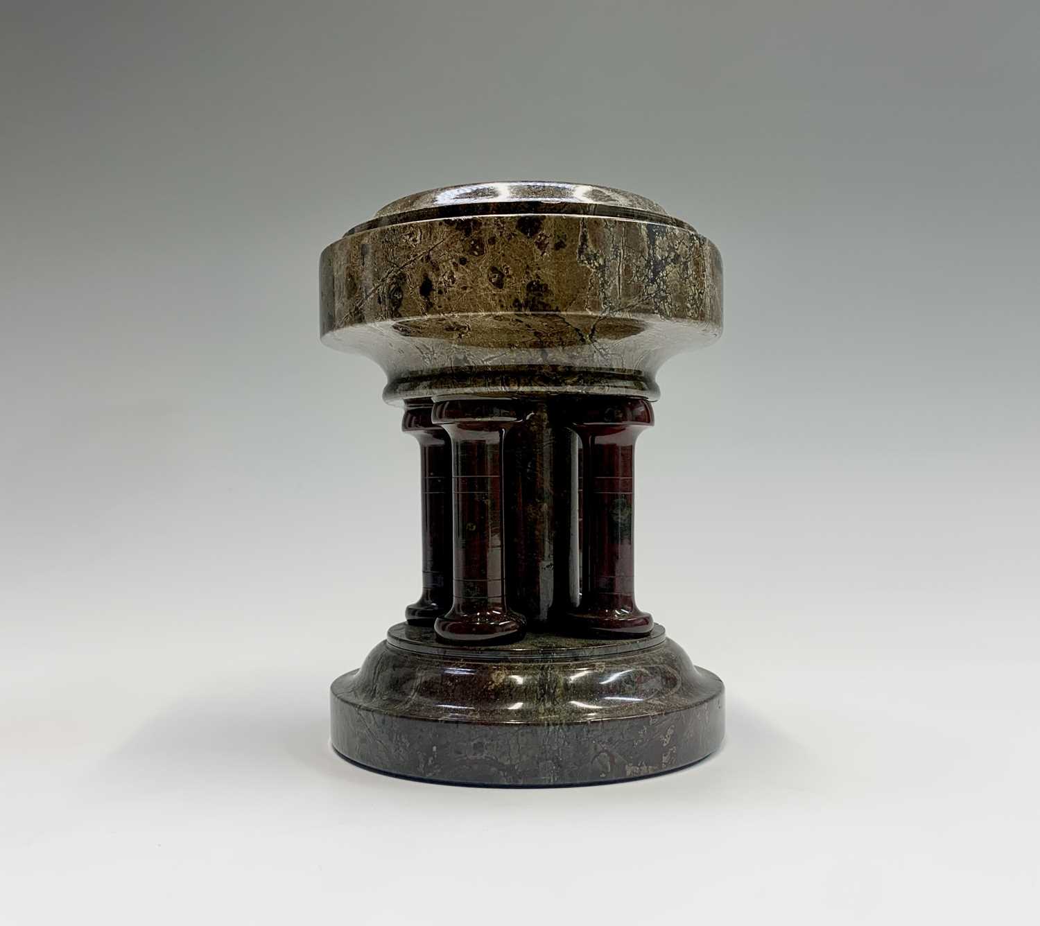 Lot 105 - A Cornish serpentine travel font of circular...