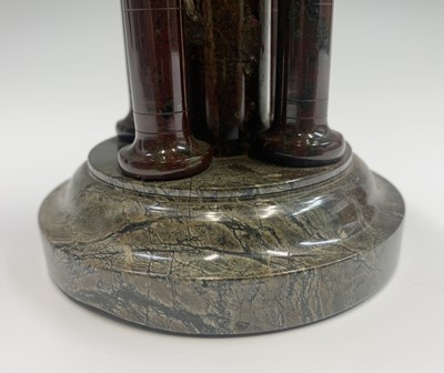 Lot 105 - A Cornish serpentine travel font of circular...