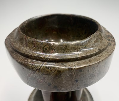 Lot 105 - A Cornish serpentine travel font of circular...