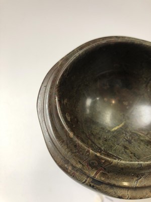 Lot 105 - A Cornish serpentine travel font of circular...