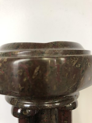 Lot 105 - A Cornish serpentine travel font of circular...