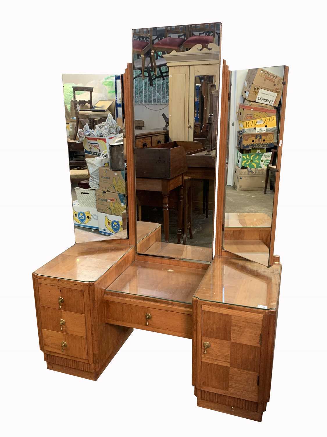 Lot 3019 - An Art Deco style teak dressing table, 20th...