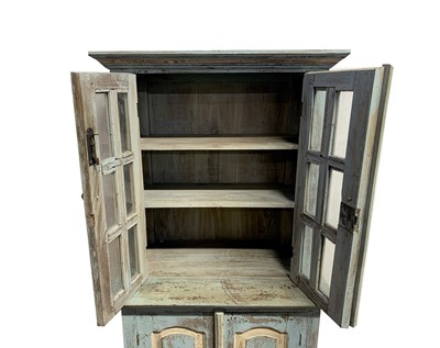Lot 65 - A French rustic blue and white painted cabinet,...