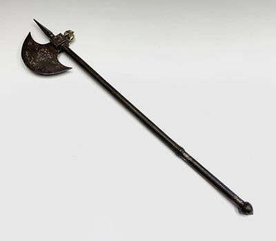 Lot 1046 - A small Indian axe, the crescent shaped blade...