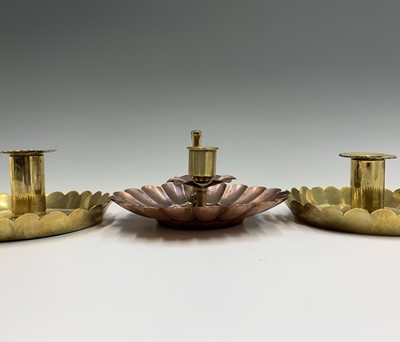 Lot 87 - A pair of brass Arts and Crafts chambersticks,...