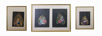 Lot 1019 - Four Indian paintings on leaves, in three gilt...