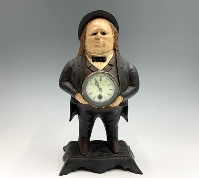 Lot 2905 - A painted cast iron clock modelled as John...