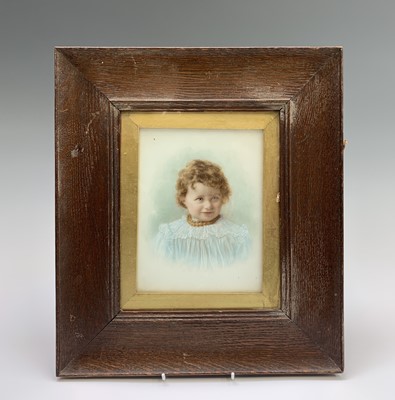 Lot 165 - A coloured photographic portrait on opaque...