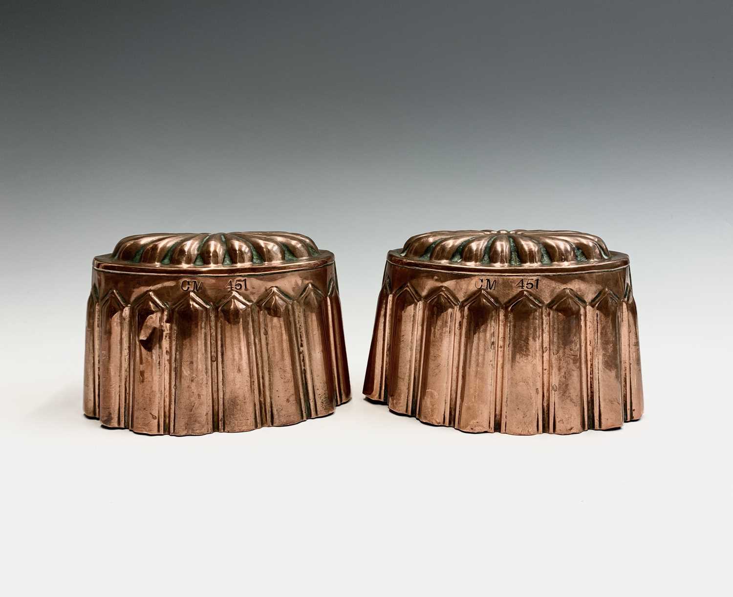 Lot 12 - A pair of copper jelly moulds, 19th century,...