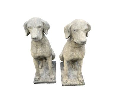 Lot 601 - A pair of churchstone hounds. Height 72cm.