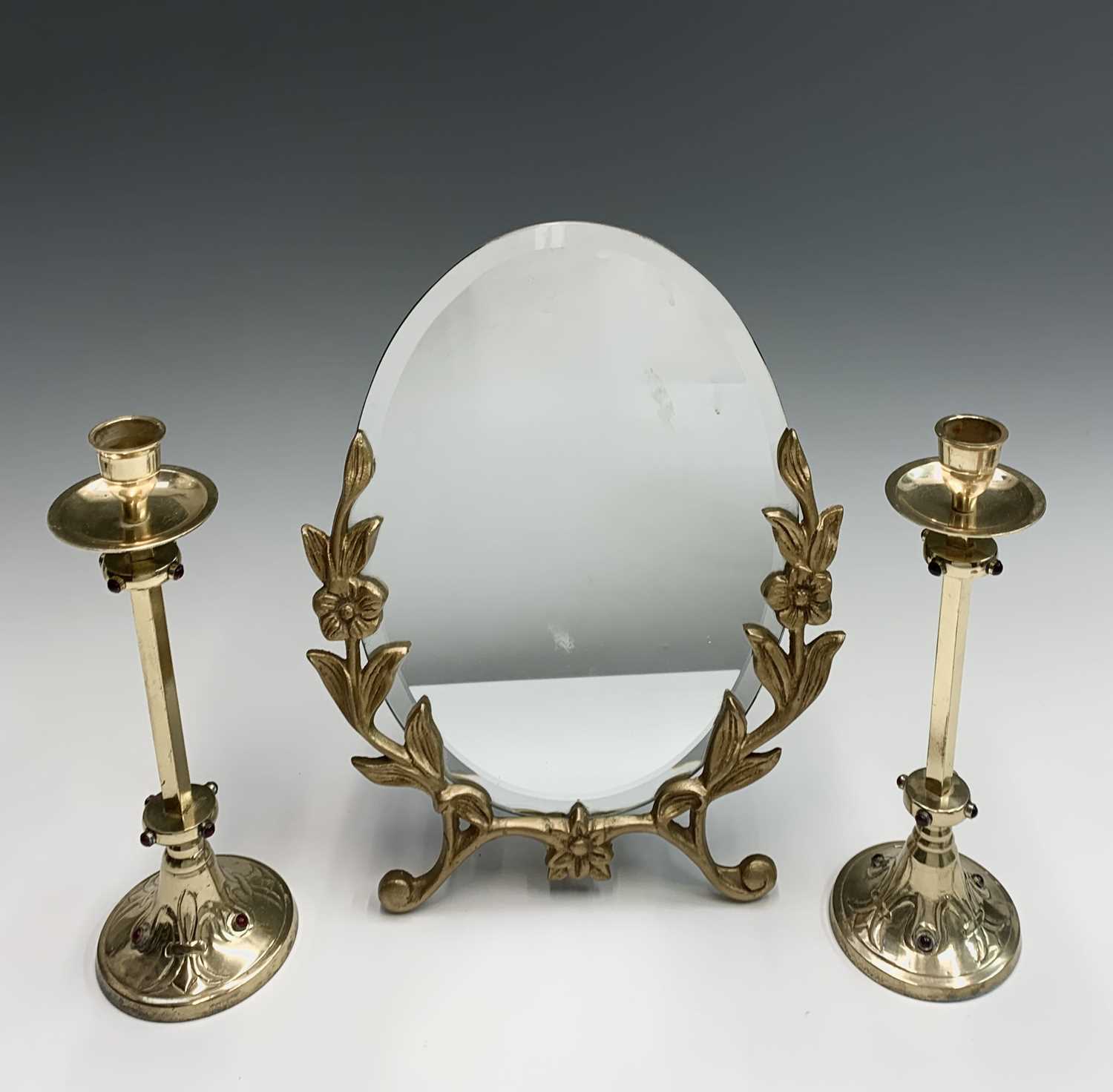 Lot 155 - A gilt metal mounted easel mirror, with floral...