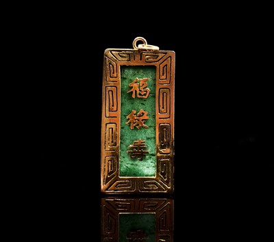 Lot 44 - A Chinese gold mounted spinach jade...