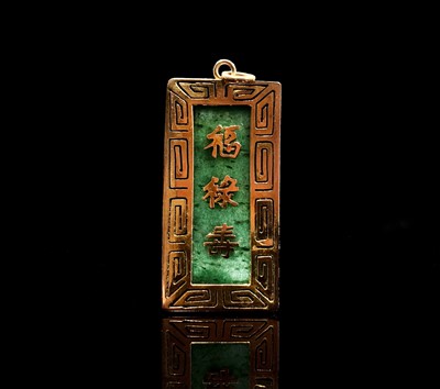 Lot 44 - A Chinese gold mounted spinach jade...
