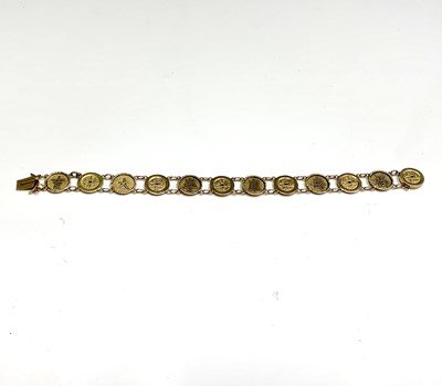 Lot 16 - A Chinese gold bracelet with twelve 'cash'...